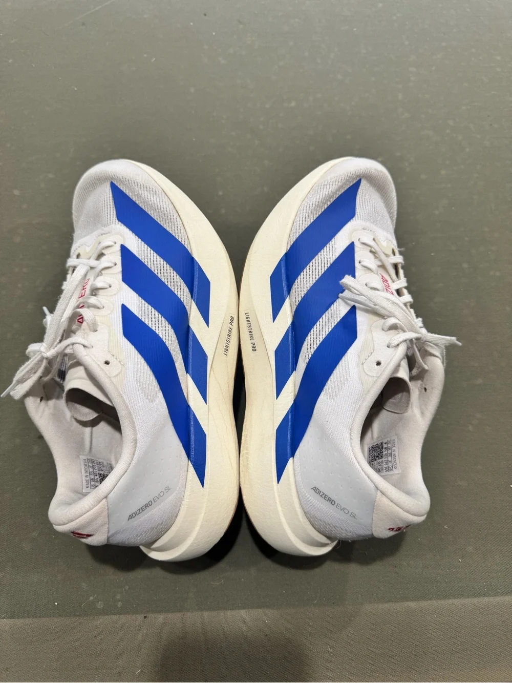 Adidas Evo SL White Sneakers with Royal Blue Stripes